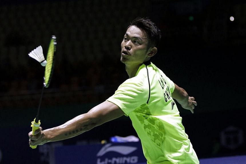 Lin Dan of China returns a shot against Hsu Jen Hao of Taiwan during the men's singles first round of the Badminton China Open held in Fuzhou, China's Fujian province on Nov 12, 2014.&nbsp;Chinese badminton superstar Lin Dan says he hopes world No. 1