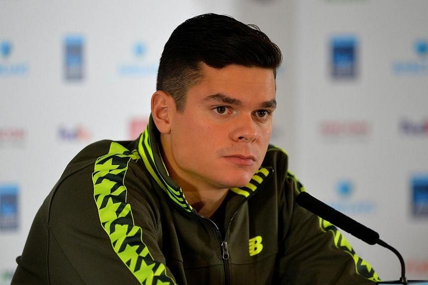 Canada's Milos Raonic has withdrawn from the ATP Tour Finals in London owing to injury and been replaced by Spain's David Ferrer. -- PHOTO: AFP