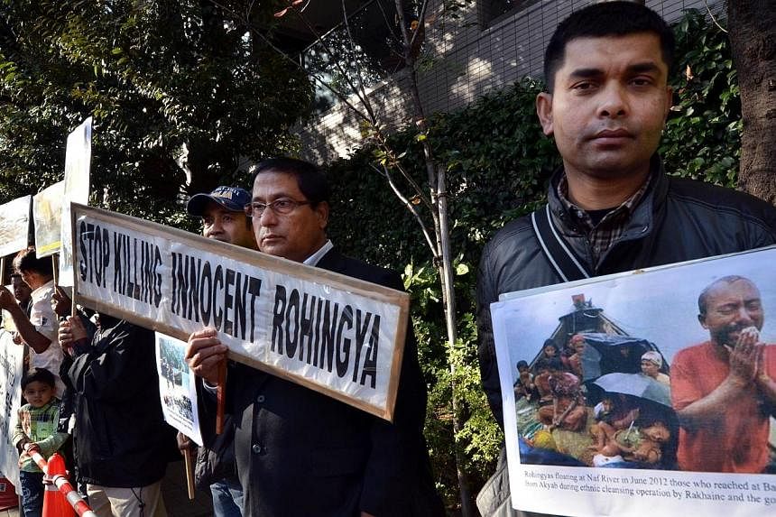 Myanmar ethnic Rohingya Muslims living in Japan stage a rally outside of the Myanmar embassy in Tokyo on Nov 4, 2014 against reported plans to relocate Rohingya to settlement sites. Most of Myanmar's 1.1 million Rohingya Muslims are stateless and liv