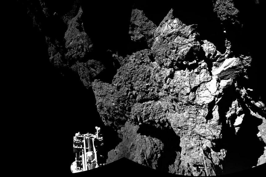 A new image shows the view from the Philae lander of the surface of the comet.&nbsp;Europe's robot lab Philae was "working well" on the surface of its host comet, though likely perched on a steep slope, ground controllers said a day after the probe m