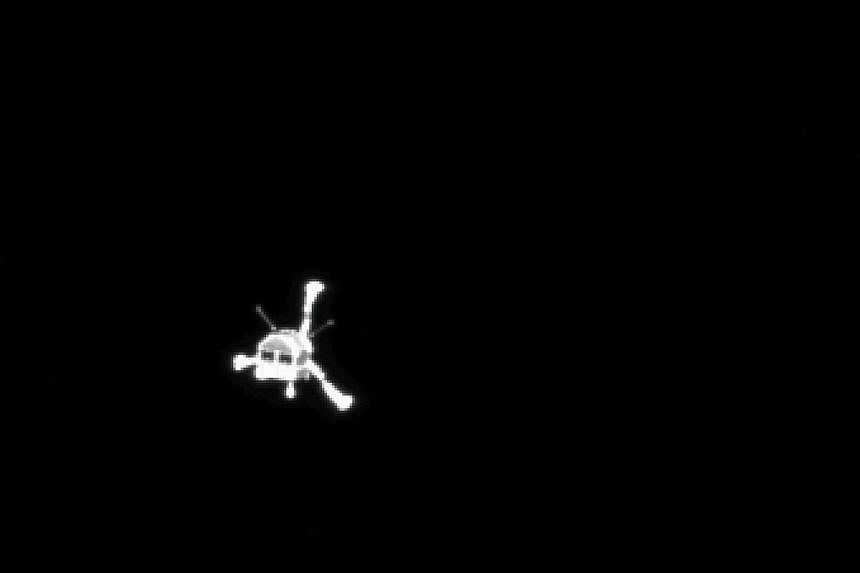 The Philae lander on Nov 12, 2014 after it separated from the spaceship Rosetta. -- PHOTO: REUTERS