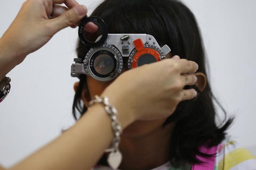 Instead of merely asking to test how well you can see, you should ask for a more comprehensive eye health check the next time you visit a spectacle shop, say experts. -- ST PHOTO: KEVIN LIM