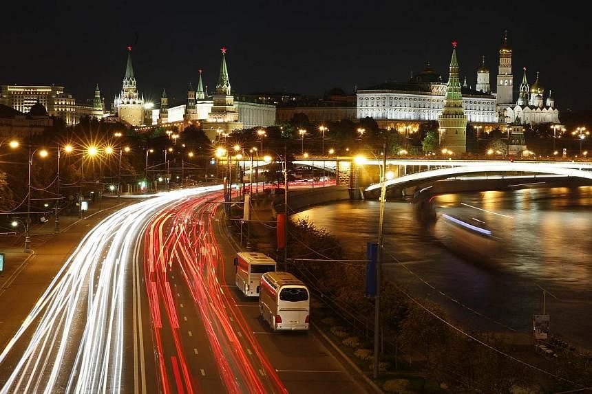 Traffic flows along the bank of the Moscow River in Moscow, Sept 16, 2014.&nbsp;Russia has been hunting a mysterious gang that has terrorised Moscow motorists in recent months with a series of murders resembling the violent video game Grand Theft Aut