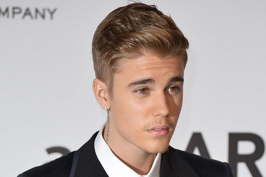 A photo taken on May 22, 2014 photo shows Canadian singer Justin Bieber at the 67th Cannes Film Festival in southern France. -- PHOTO: AFP