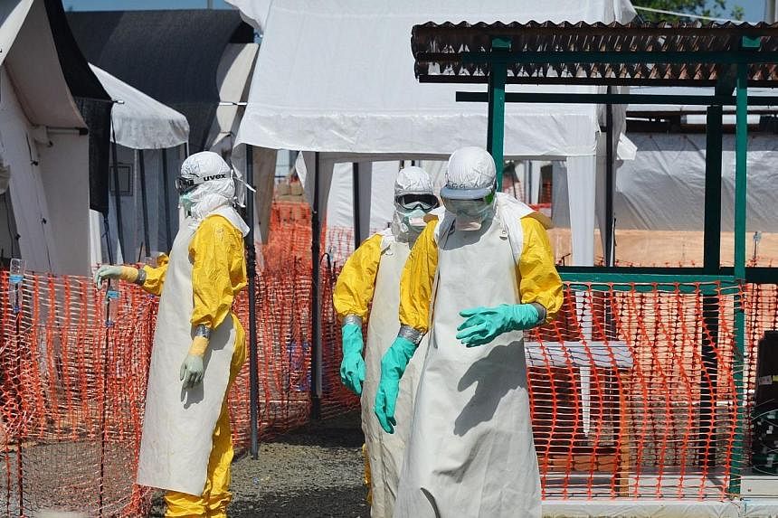 Millions of lives could be lost in a global pandemic if the international community repeats its tardy response to West Africa's Ebola outbreak, World Bank President Jim Yong Kim warned Friday. -- PHOTO: AFP