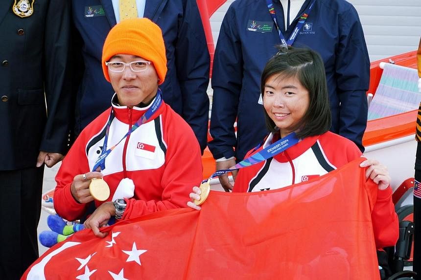 Singapore para sailors Jovin Tan (left) and Yap Qian Yin, who won gold in the Hansa303Double Handed event at the Asian Para Games held in Incheon, South Korea on Oct 22, 2014.&nbsp;The success of Singapore's sailors were celebrated for the second mon