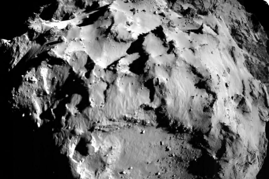 Comet 67P/CG, acquired by the ROLIS instrument on the Philae lander during descent from a distance of approximately 3 km (1.86 miles) from the surface is pictured in this November 12, 2014 European Space Agency (ESA) handout image. The ESA landed the