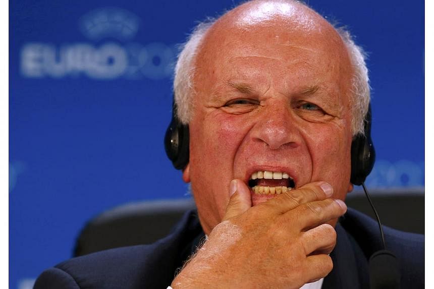 British Football Association chairman Greg Dyke reacts during a press conference after the announcement of the 13 cities which will host matches at the Euro 2020 tournament to be played across the continent, during a ceremony in Geneva on Sept 19, 20