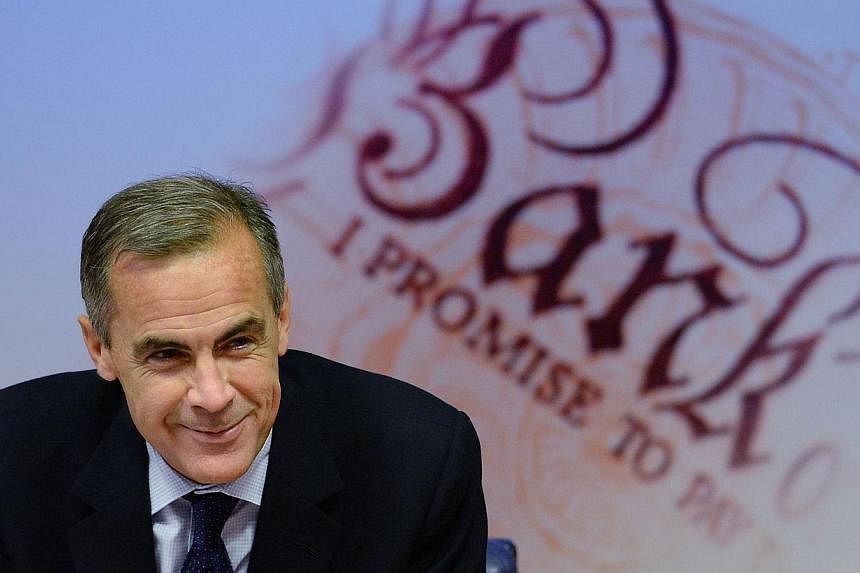 Governor of the Bank of England Mark Carney addresses a quarterly inflation report press conference at the Bank of England in London, on Nov 12, 2014.&nbsp;The Bank of England is cutting down on wine and has started serving beer instead since Canadia
