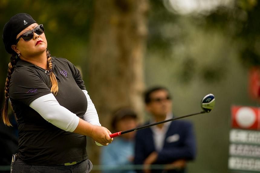 Christina Kim of the United States plays a tee shot at the fourth hole during the first round of the 2014 Lorena Ochoa Invitational presented by Banamex at Club de Golf Mexico on Nov 13, 2014, in Mexico City, Mexico.&nbsp;American Christina Kim, seek
