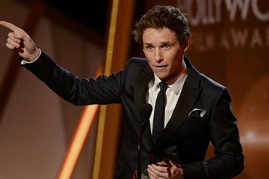Eddie Redmayne accepts the Hollywood Breakout Performance Actor award for his role in The Theory of Everything during the Hollywood Film Awards in Hollywood, California on Nov 14, 2014. -- PHOTO: REUTERS