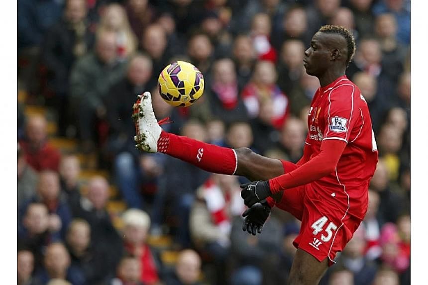 Liverpool's Mario Balotelli controls the ball during their English Premier League soccer match against Chelsea at Anfield in Liverpool, northern England on Nov 8, 2014. -- PHOTO: REUTERS