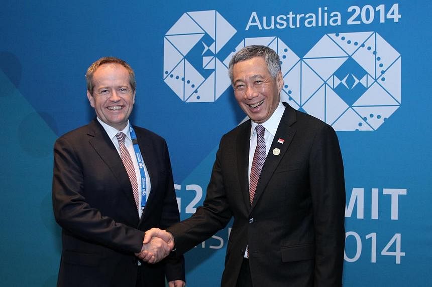 Singapore Prime Minister Lee Hsien Loong meeting Australia's opposition leader Bill Shorten&nbsp;on Nov 15, 2014 while in Brisbane for the Group of 20 Summit. --&nbsp;PHOTO: MINISTRY OF COMMUNICATIONS AND INFORMATION