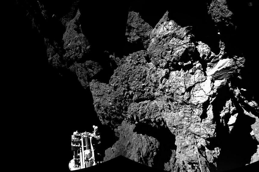 A view of the comet’s surface from Philae, with one of the probe’s three feet visible in the foreground. -- PHOTO: EUROPEAN SPACE AGENCY