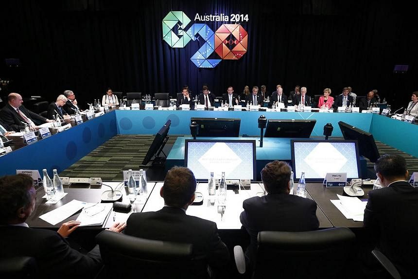 G-20 leaders representing the bulk of the world's economy committed to reform measures to lift their collective growth by an extra 2.1 per cent by 2018. -- PHOTO: AFP&nbsp;