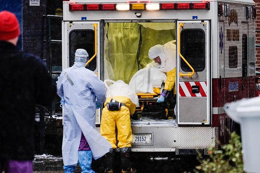 Dr. Martin Salia, a surgeon infected with the Ebola virus while working in Sierra Leone, arrives at the Nebraska Medical Center on Nov 15, 2014 in Omaha, Nebraska. -- PHOTO: AFP