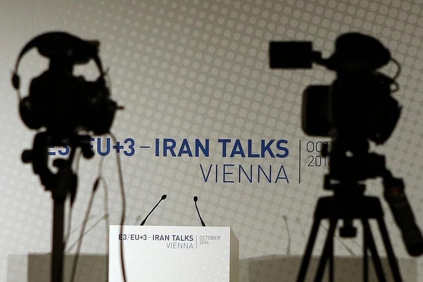 Video cameras are set up for a news conference prior to a meeting between EU foreign policy chief Catherine Ashton and Iranian Foreign Minister Mohammad Javad Zarif in Vienna in this Oct 14, 2014 file photo. -- PHOTO: REUTERS