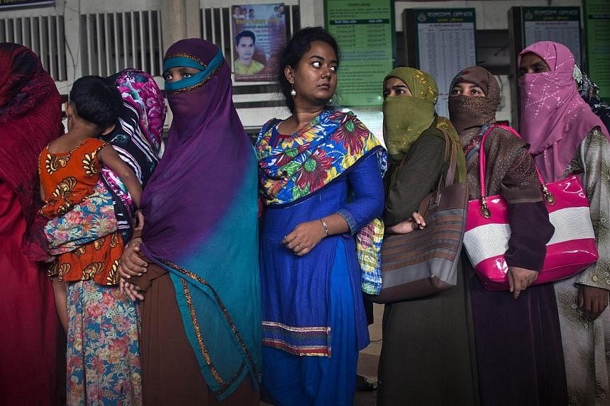Suspected Islamic militants have hacked to death a university professor in western Bangladesh, several years after he led a push to ban students wearing full-face veils, police said Sunday. -- PHOTO: AFP