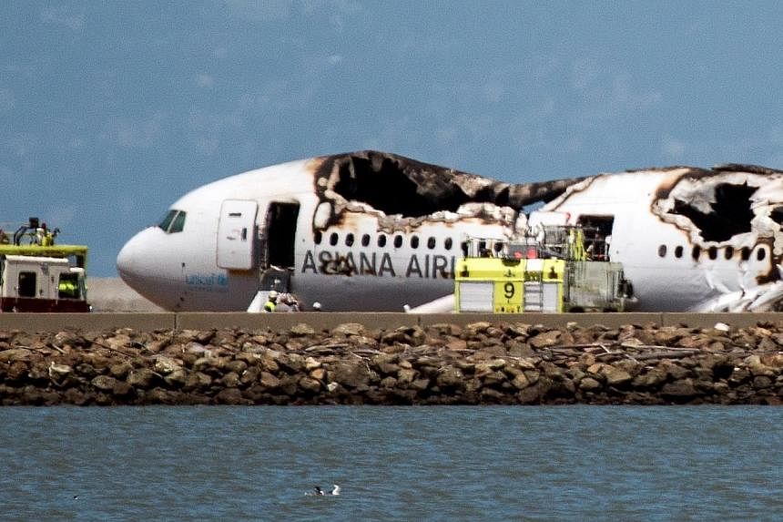 A Boeing 777 operated by Asiana Airlines sits on the runway after it crashed landed at San Francisco International Airport (SFO) on July 6, 2013.&nbsp;South Korea's Asiana Airlines on Monday, Nov 17, appealed against a government decision to suspend 