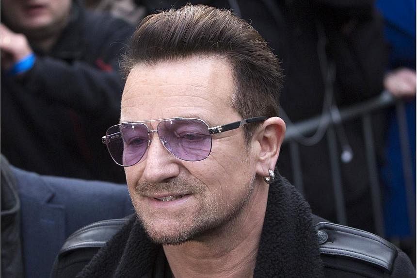 U2 frontman Bono will be getting surgery after injuring his arm in a fall from his bicycle in New York's Central Park, the band said on Sunday. -- PHOTO: REUTERS