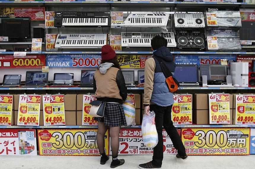 An electronics retail store in Tokyo on Nov 16, 2014. -- PHOTO: REUTERS