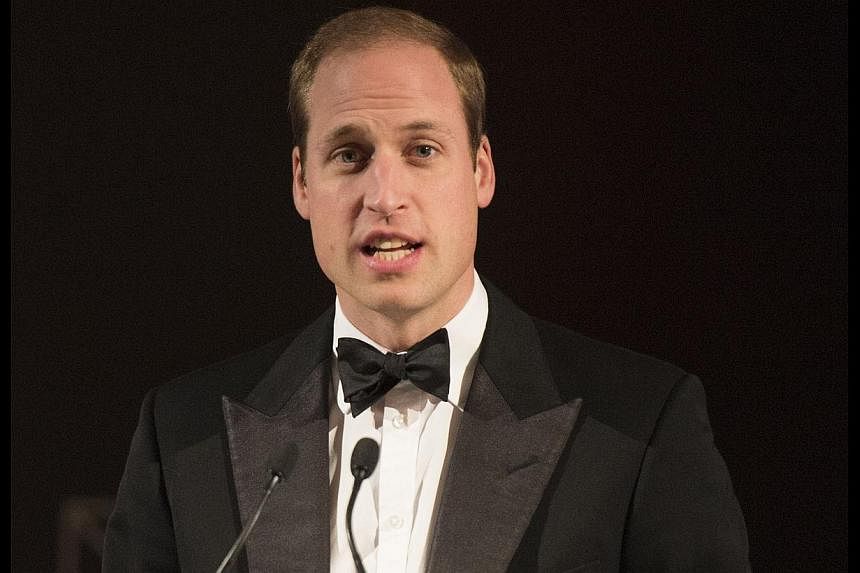 Britain's Prince William teamed up with the makers of Angry Birds to release a new game that will highlight the dangers of illegal poaching. -- PHOTO: AFP