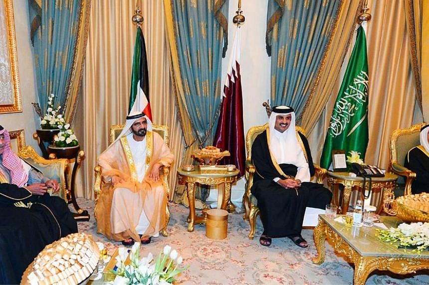 Saudi Arabia's Deputy Prime Minister Prince Muqrin bin Abdulaziz al-Saud, United Arab Emirates ruler of the emirate of Dubai, Sheikh Mohammed bin Rashid al-Maktoum, Qatar's Emir Sheikh Tamim bin Hamad al-Thani, and Emir of Kuwait Sheikh Sabah al-Ahma