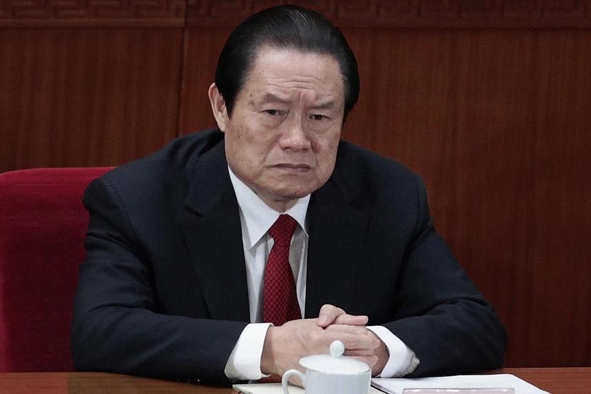 China's former Politburo Standing Committee Member Zhou Yongkang attends the closing ceremony of the National People's Congress (NPC) at the Great Hall of the People in Beijing in this March 14, 2012, file photo.&nbsp;Disgraced former Chinese domesti