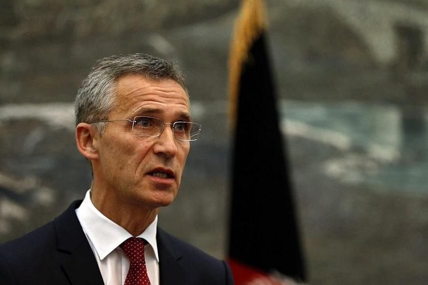 NATO Secretary General Jens Stoltenberg speaks during a news conference in Kabul on Nov 6, 2014.&nbsp;Russia is making a "very serious" military build-up in Ukraine and on their shared border, deploying troops and sophisticated equipment including ai