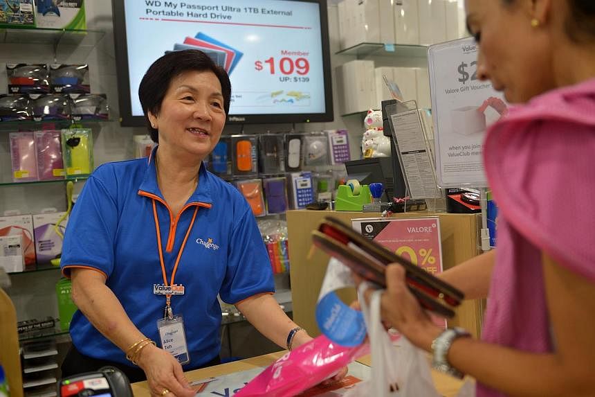 The seniors advocacy arm of the People's Action Party (PAP) wants to make it a legal requirement for companies to raise the re-enployment age from 65 to 67. -- PHOTO: ST FILE