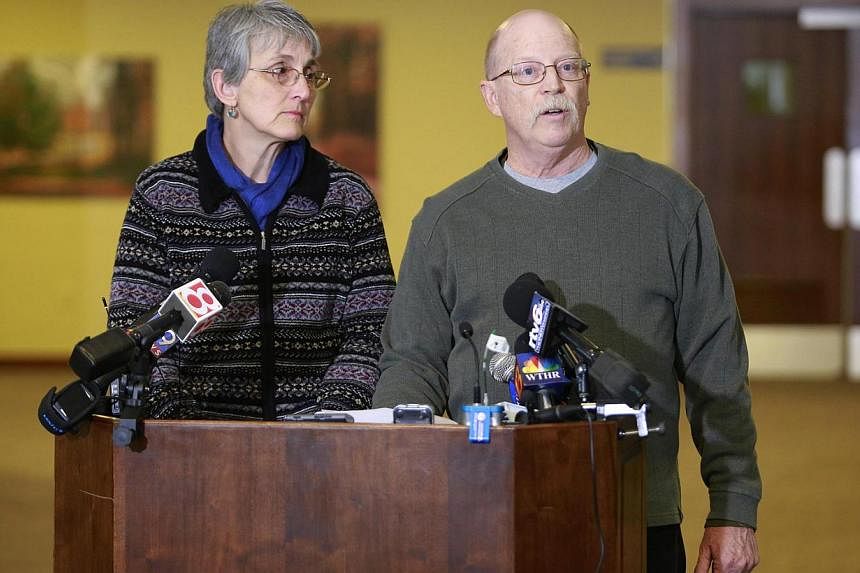 Paula and Ed Kassig, the parents of US aid worker Peter Kassig who was beheaded by ISIS militants, speaking to the press in Indianapolis, Indiana, on Nov 17, 2014. The Kassigs asked for prayers for other captives in Syria and Iraq in a brief public s
