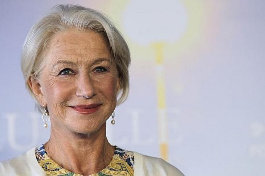 British actress Helen Mirren poses during a photocall to present the movie he hundred-foot journey in September during the 40th Deauville's US Film Festival in the French northwestern sea resort of Deauville, before becoming embroiled in Italian poli