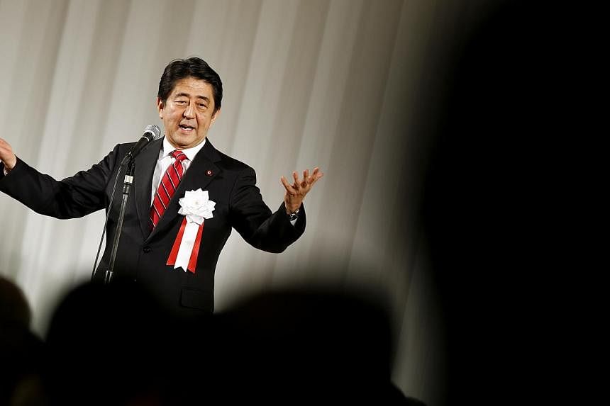 Japan's Prime Minister Shinzo Abe delivers a speech during a ceremony marking the 50th anniversary of the founding of the Komeito Party in Tokyo on Nov 17, 2014. Mr Abe is set on Tuesday to call a snap election, and seek voters' endorsement for more 