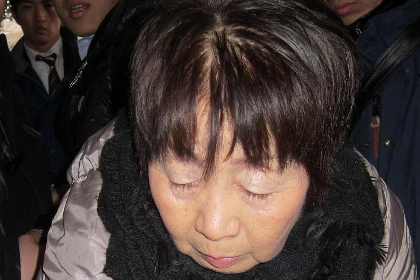 Japanese woman Chisako Kakehi, 67, &nbsp;was arrested in Kyoto on Nov 19, 2014, on suspicion of poisoning her husband with cyanide in the latest "black widow" case. -- PHOTO: AFP