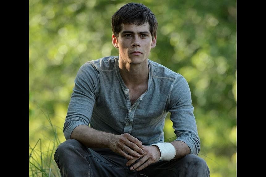 Actors Robert Pattinson and Kristen Stewart (both left) were the leads of the Twilight film franchise. Actor Dylan O'Brien in The Maze Runner (above).