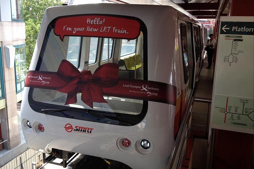 The first two of 13 new train cars that were added to the Bukit Panjang LRT system on Wednesday. The additional cars will help to improve capacity and train frequencies along the network. -- ST PHOTO: ADRIAN LIM&nbsp;