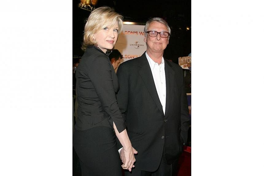 Director Mike Nichols and his wife Diane Sawyer as they arrive at the premiere of Charlie Wilson's War, in Universal Studio, Los Angeles, California on&nbsp;Dec 10, 2007. -- PHOTO: AFP
