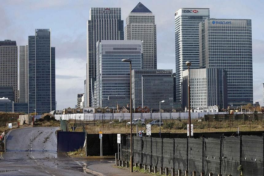 The Canary Wharf financial district in east London. Britain's Financial Conduct Authority said on Nov 12, 2014, it has imposed fines totalling US$1.7 billion (S$2.2 billion) on five banks for failing to control business practices in their G10 spot fo
