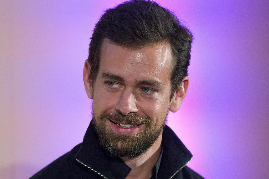 Twitter chairman Jack Dorsey announcing at an event in London on Nov 20, 2014, the launch of Square Register mobile application. The app will allow merchants to track sales, inventories and other data on smartphones and tablets. -- PHOTO: AFP