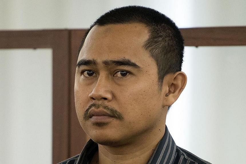 Malaysian diplomate Muhammad Rizalman Ismail, who is charged with attempted rape, stands in the dock at the Wellington District Court on Oct 28, 2014. -- PHOTO: AFP