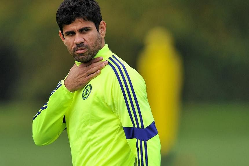 Chelsea manager Jose Mourinho believes Diego Costa (above) has recovered from his long-standing injury problems and is now ready to play a full part in Chelsea's testing run of fixtures to the turn of the year. -- PHOTO: AFP