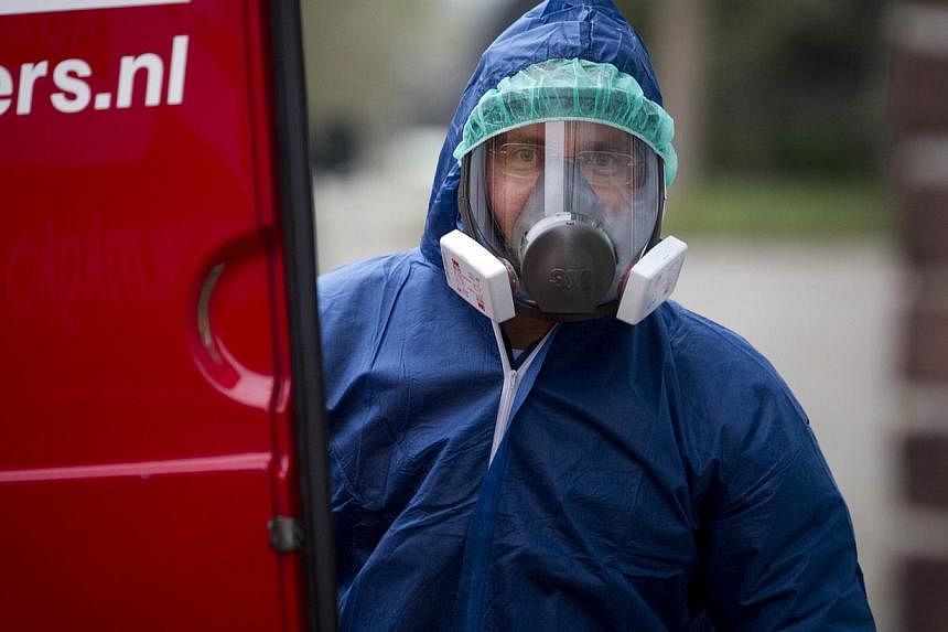 A Dutch bird flu outbreak has spread to a third farm, the government said on Friday, prompting inspections at dozens of other farms in the Netherlands, a leading exporter of eggs and poultry. -- PHOTO: AFP