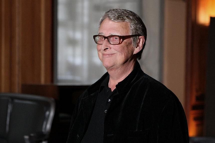 Film director Mike Nichols poses in Paris, during a photocall for his new movie Charlie Wilson's War in France on Jan 11, 2008. -- PHOTO: AFP