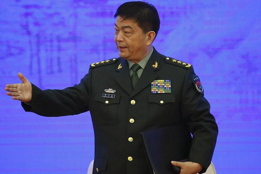 China's Defence Minister Chang Wanquan gestures after he delivered a speech during a security forum attended by senior officials and academics from Central Asia and the Asia-Pacific, in Beijing on Nov 21, 2014. -- PHOTO: REUTERS