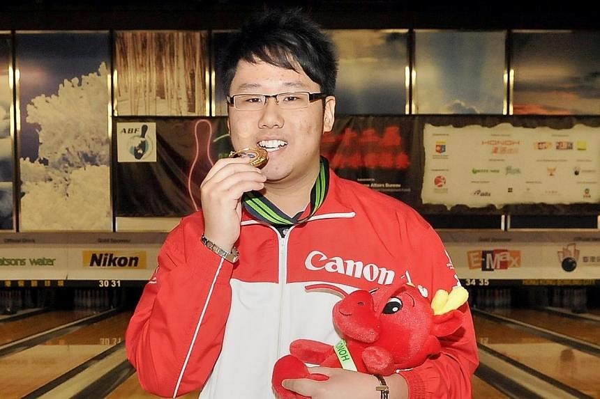 This photo shows Keith Saw clinching his first major bowling honour in 2012, winning the men’s singles title at the 22nd Asian Tenpin Bowling Championships in Hong Kong. The bowler has won his first national title on Saturday, when he came out tops
