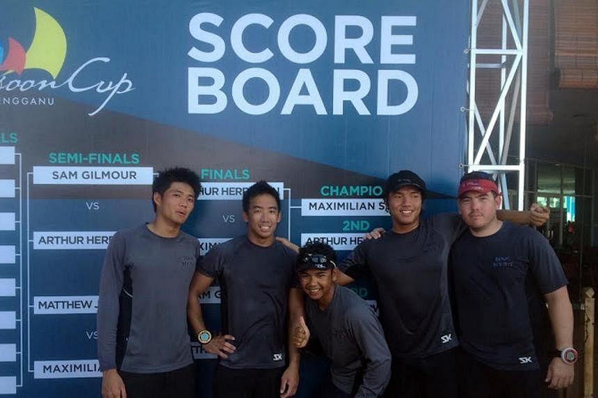 Sailors (from left) Russell Kan, Justin Wong, Malaysian Mohd Saifullah, Maximilian Soh and Christopher Lim.&nbsp;The Singapore flag will fly for the first time at the Monsoon Cup when it is held next February, after keelboat side Team Red Dot won the