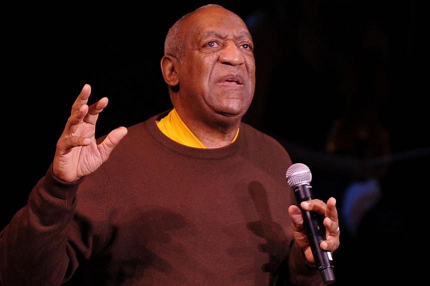 An Oct 21, 2010 file photo shows comedian Bill Cosby performing onstage in New York City.&nbsp;Cosby and Las Vegas' Treasure Island casino have cancelled his scheduled Nov 28 show by "mutual agreement," the casino said in a statement on Friday. -- PH
