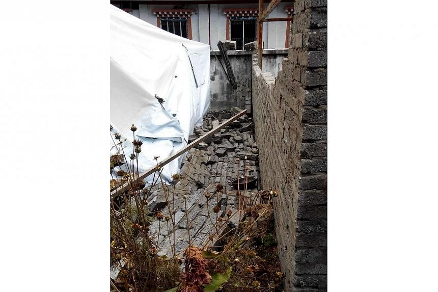 A 5.9 magnitude earthquake struck China’s southwestern province of Sichuan on Saturday, the US Geological Survey said, with Chinese state media reporting one killed and 15 injured. -- PHOTO: AFP