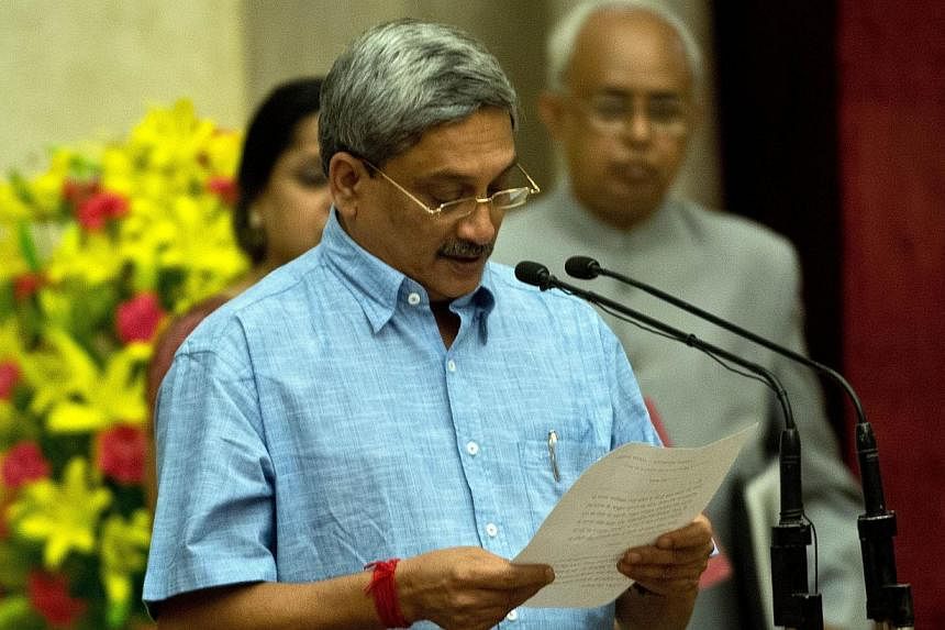 The Defence Acquisition Council, which clears high-value military procurements, issued the tender after holding its first meeting under new Defence Minister Manohar Parrikar (pictured). -- PHOTO: AFP