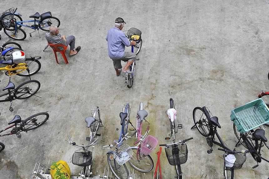 Members of the public can now park their bicycles with greater peace of mind. -- ST PHOTO: ASHLEIGH SIM